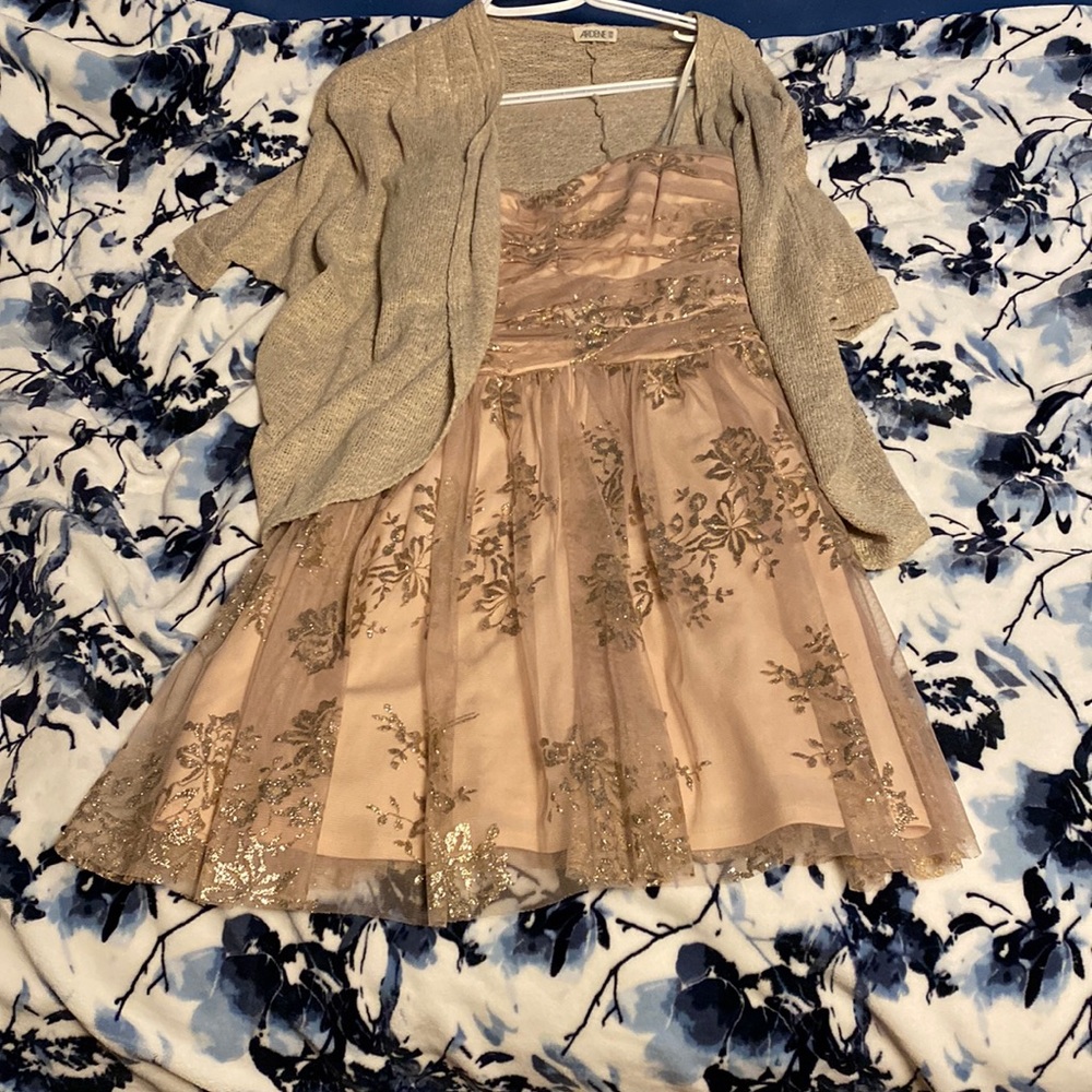 Dress with sweater.